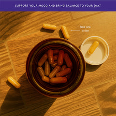 Aurite bottle on desk visualizes a calm, focused daily routine with saffron support.