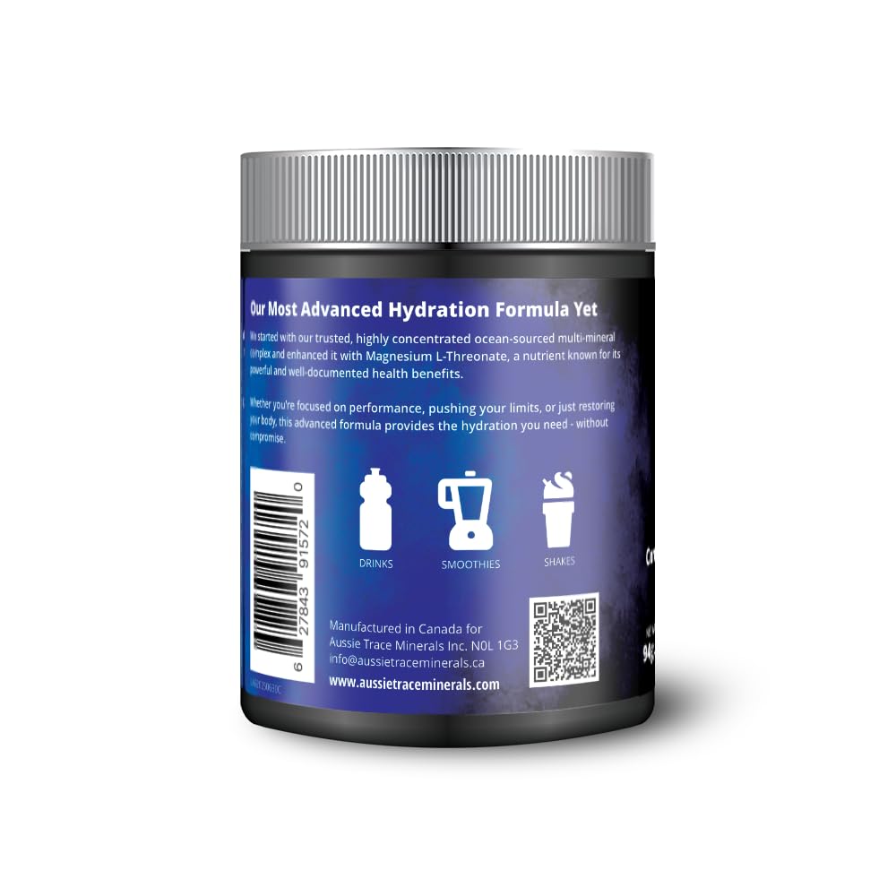 Scooping powder into glass to create sugar-free hydration with magnesium L-threonate.