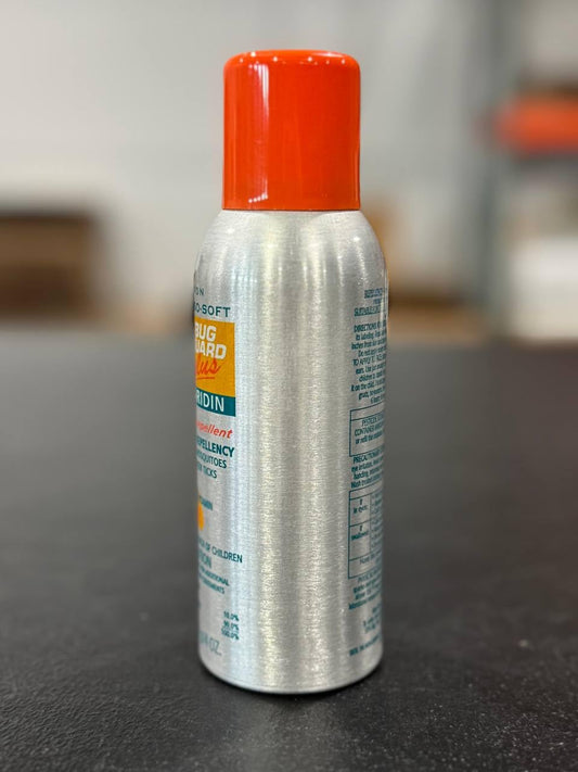 Application shot of Avon Skin So Soft Bug Guard Plus Picaridin aerosol spray outdoors.