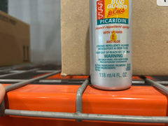Backyard barbecue with Avon Skin So Soft Bug Guard Plus Picaridin spray.