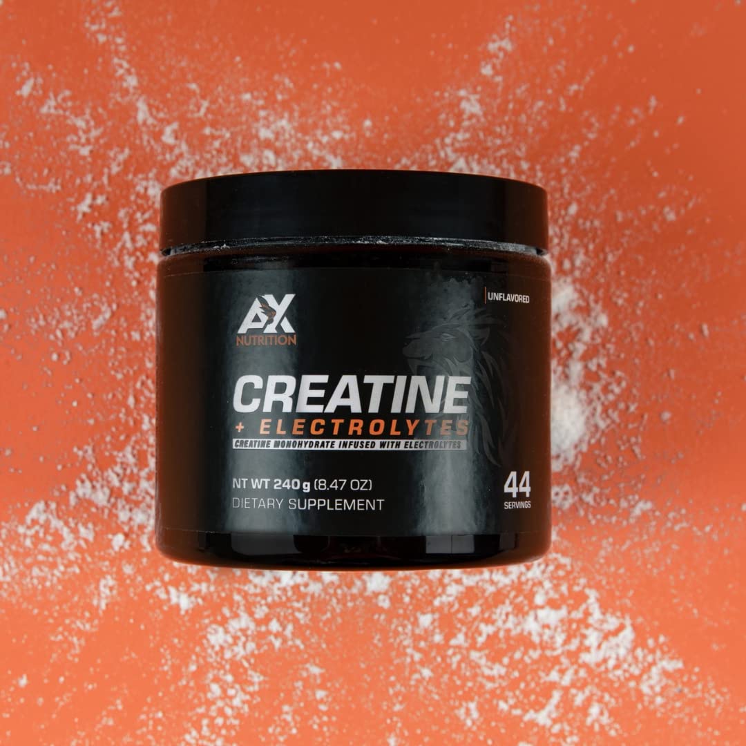AX Nutrition Creatine + Electrolytes powder scoop prepared for a pre-workout serving.