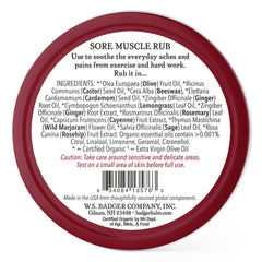 Hands applying Badger Sore Muscle Rub showing massage-friendly texture.