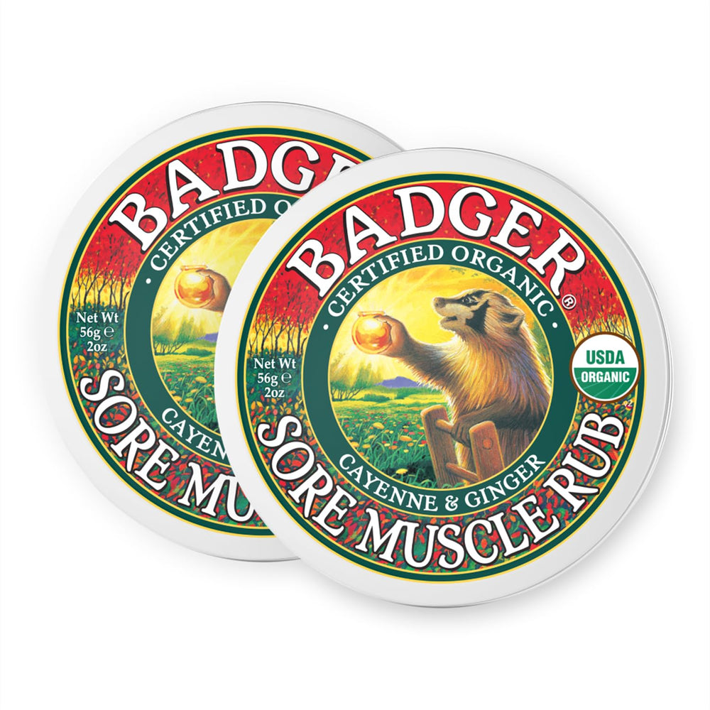 Badger Sore Muscle Rub tin front view, compact warming balm for post-activity relief.