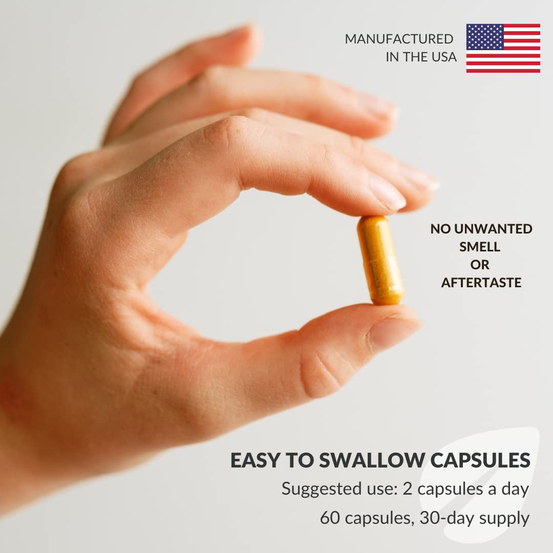 BalanceGenics open capsules showing powder-filled interior for Golden Milk or tea.