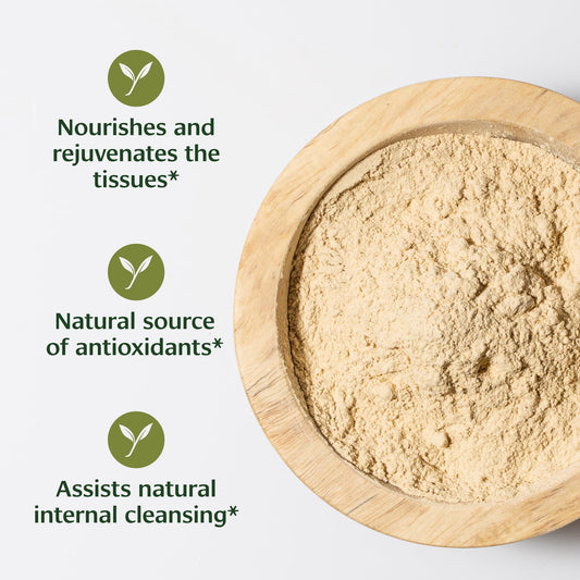 Banyan Botanicals Ashwagandha powder close-up showing organic root and earthy aroma.