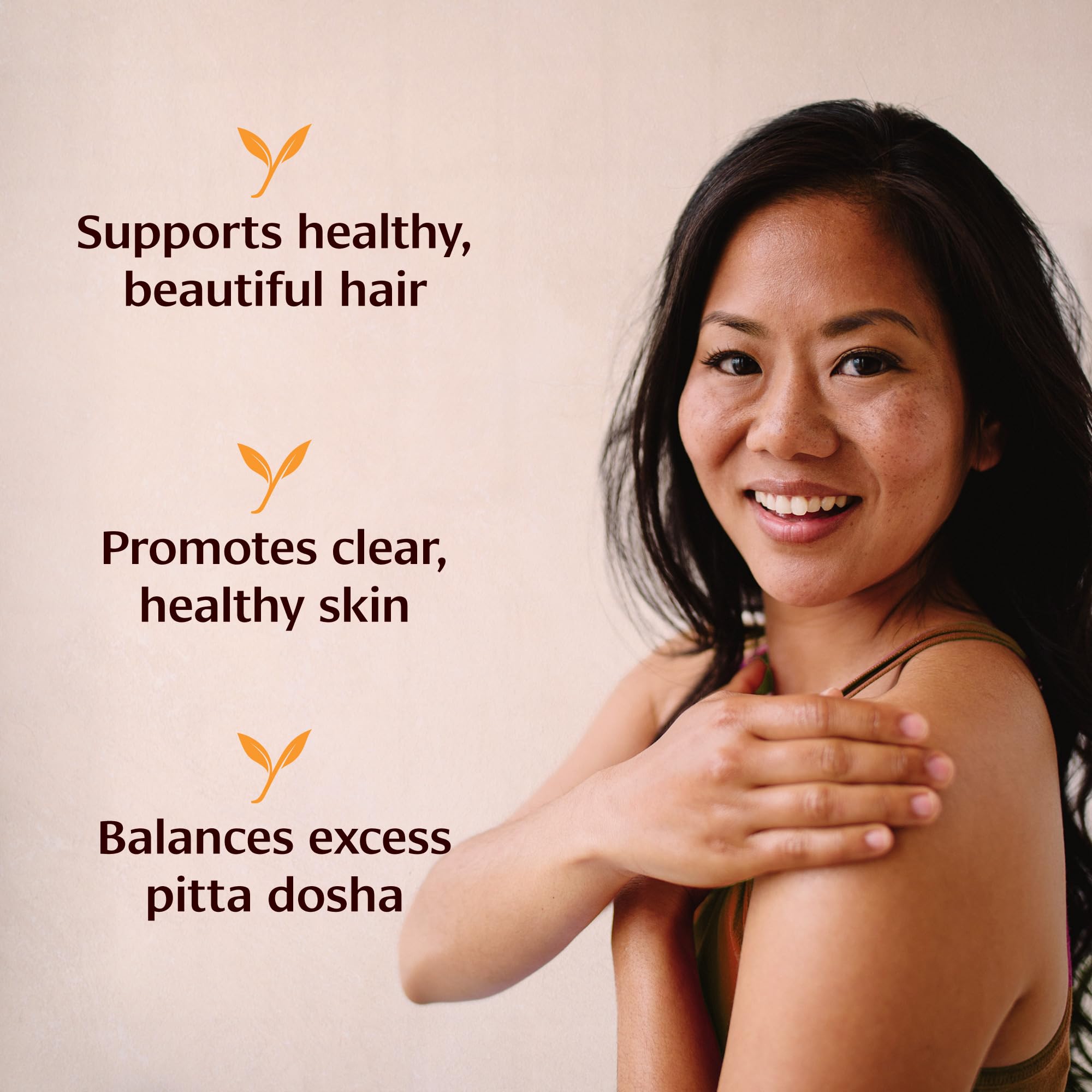 Banyan Botanicals Bhringaraj Oil+ label close-up highlighting organic, non-GMO ingredients