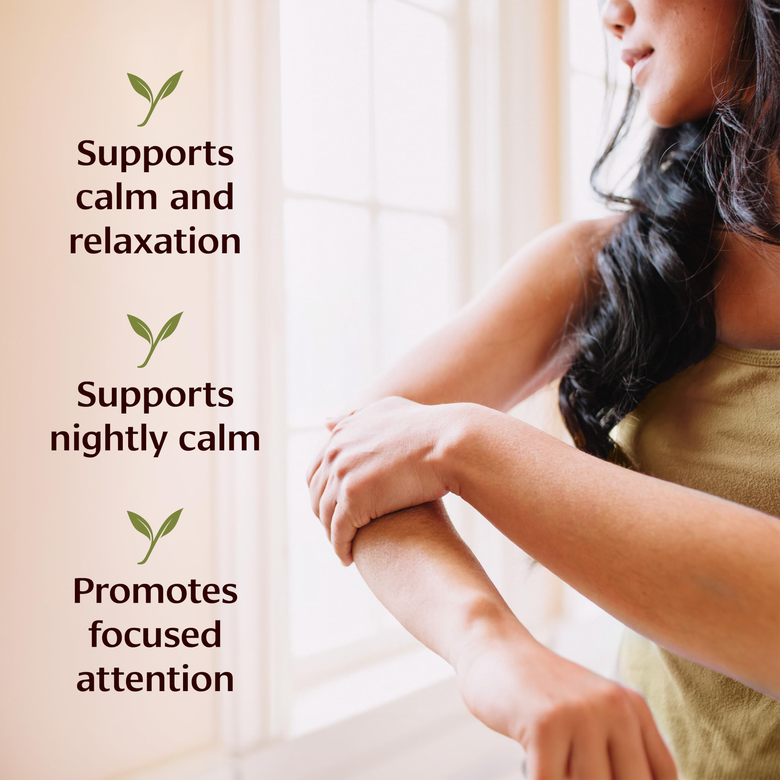 Banyan Botanicals Brahmi Oil applied to the back for relaxation