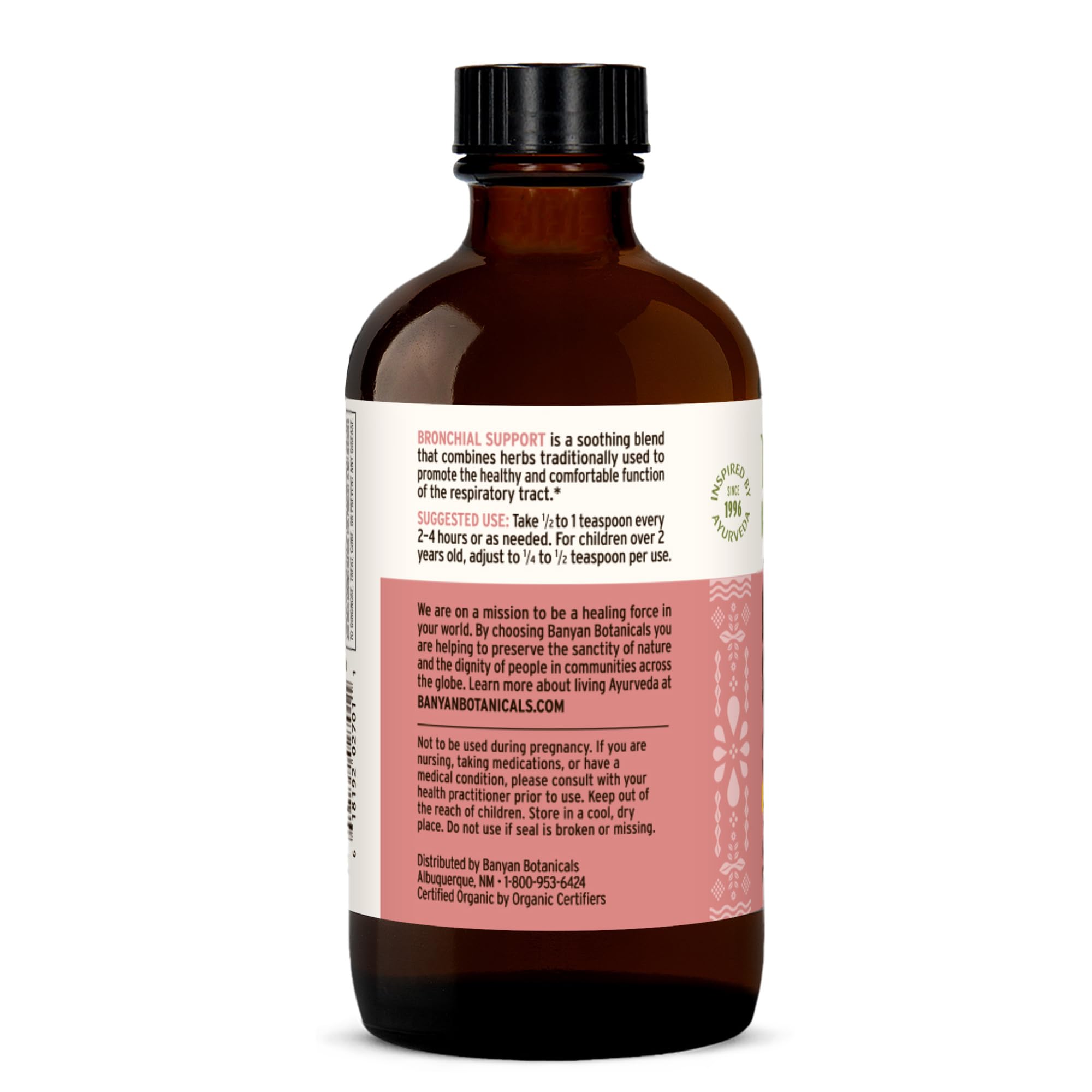 Banyan Botanicals Bronchial Support syrup being poured with kid-friendly raspberry flavor.