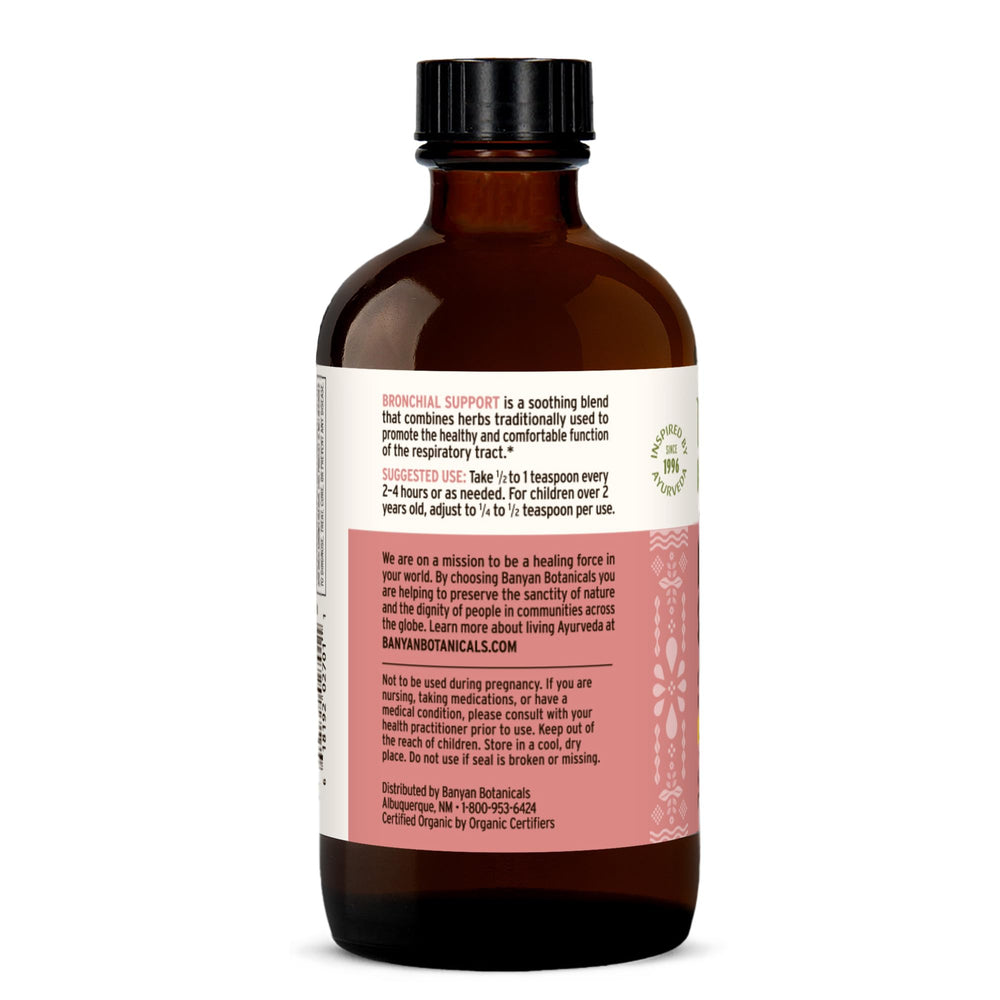 Banyan Botanicals Bronchial Support syrup being poured with kid-friendly raspberry flavor.
