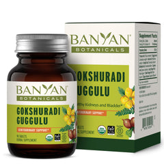 Banyan Botanicals Gokshuradi Guggulu bottle on table for urinary health support.