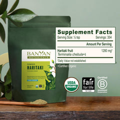 Banyan Botanicals Haritaki powder texture closeup shows fine, pure powder.