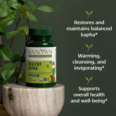 Banyan Botanicals Healthy Kapha capsules closeup highlights a digestive-support herbal blend.