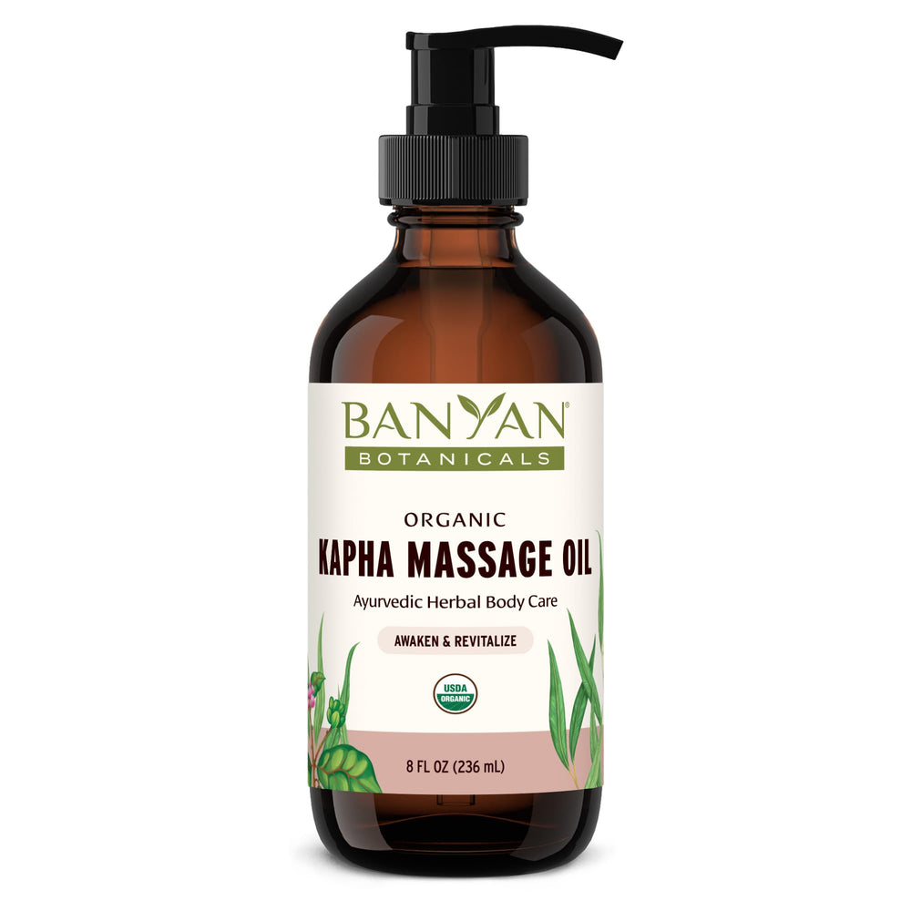 Banyan Botanicals Kapha Massage Oil bottle with Chitrak and Tulsi, warming for self-massage rituals.