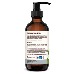 Cozy bedroom scene with Sleep Easy Oil set for unwinding.