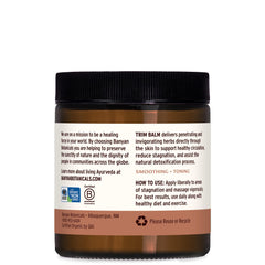 Banyan Botanicals Trim Balm on abdomen for massage relaxation.