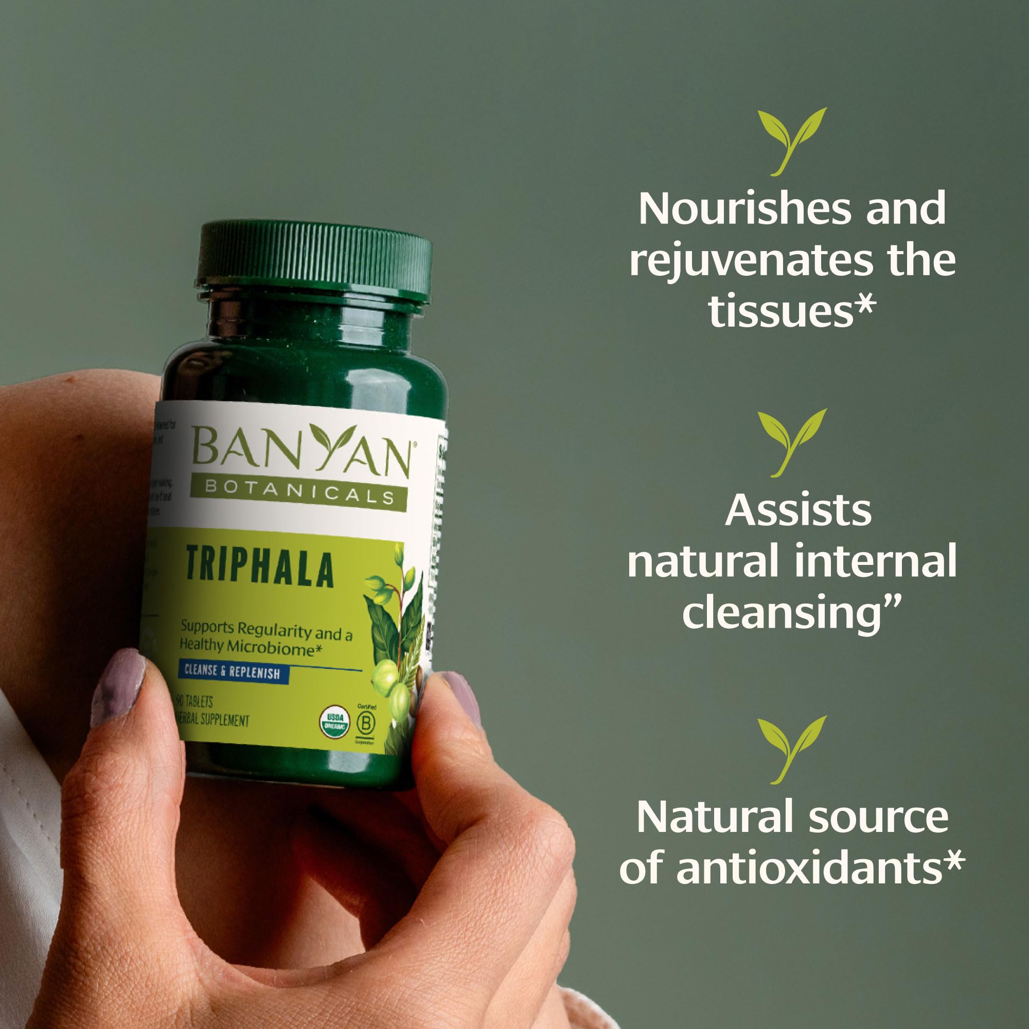 Banyan Botanicals Triphala tablets bottle pouring to illustrate easy daily use.