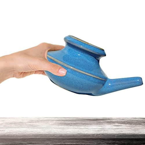 Baraka ergonomic grip neti pot enhances comfortable use during rinsing.