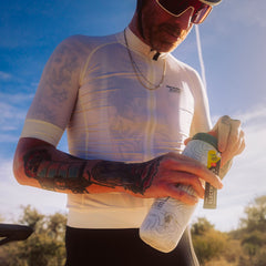 On-the-go lifestyle scene with ready-to-mix electrolyte sachets.