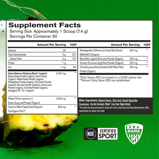 Strong Greens scoop in water ready to mix for digestion support.