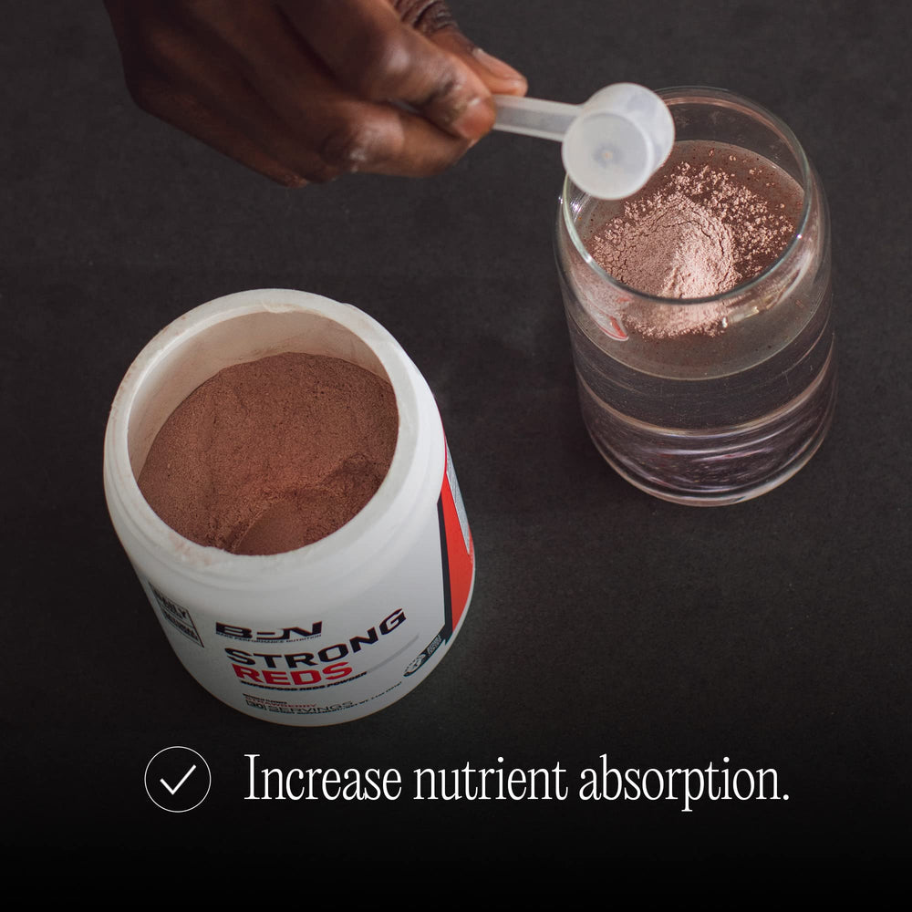 BARE PERFORMANCE NUTRITION strawberry-flavored scoop shows powder ready for smoothies.
