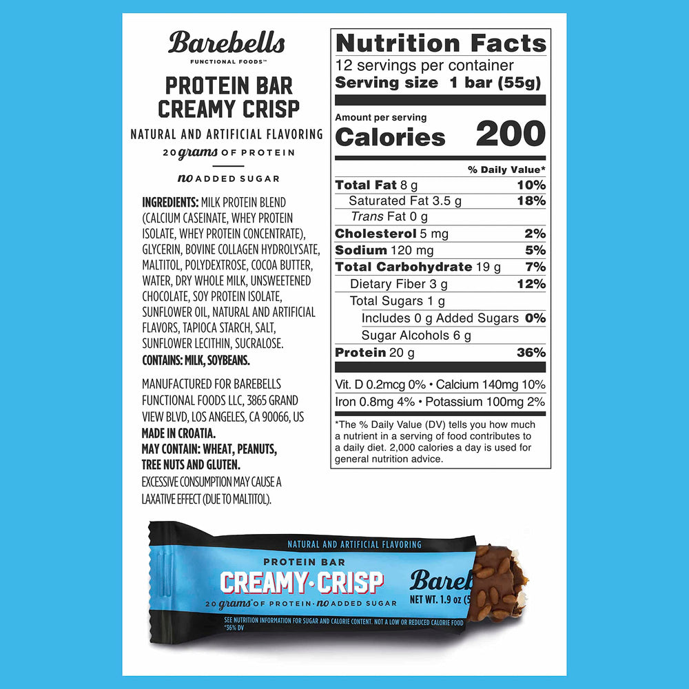 Barebells Creamy Crisp bar unwrapped, caramel center and chocolate coating visible