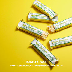 Barebells Lemon Cheesecake bar on a kitchen counter, ready to eat.