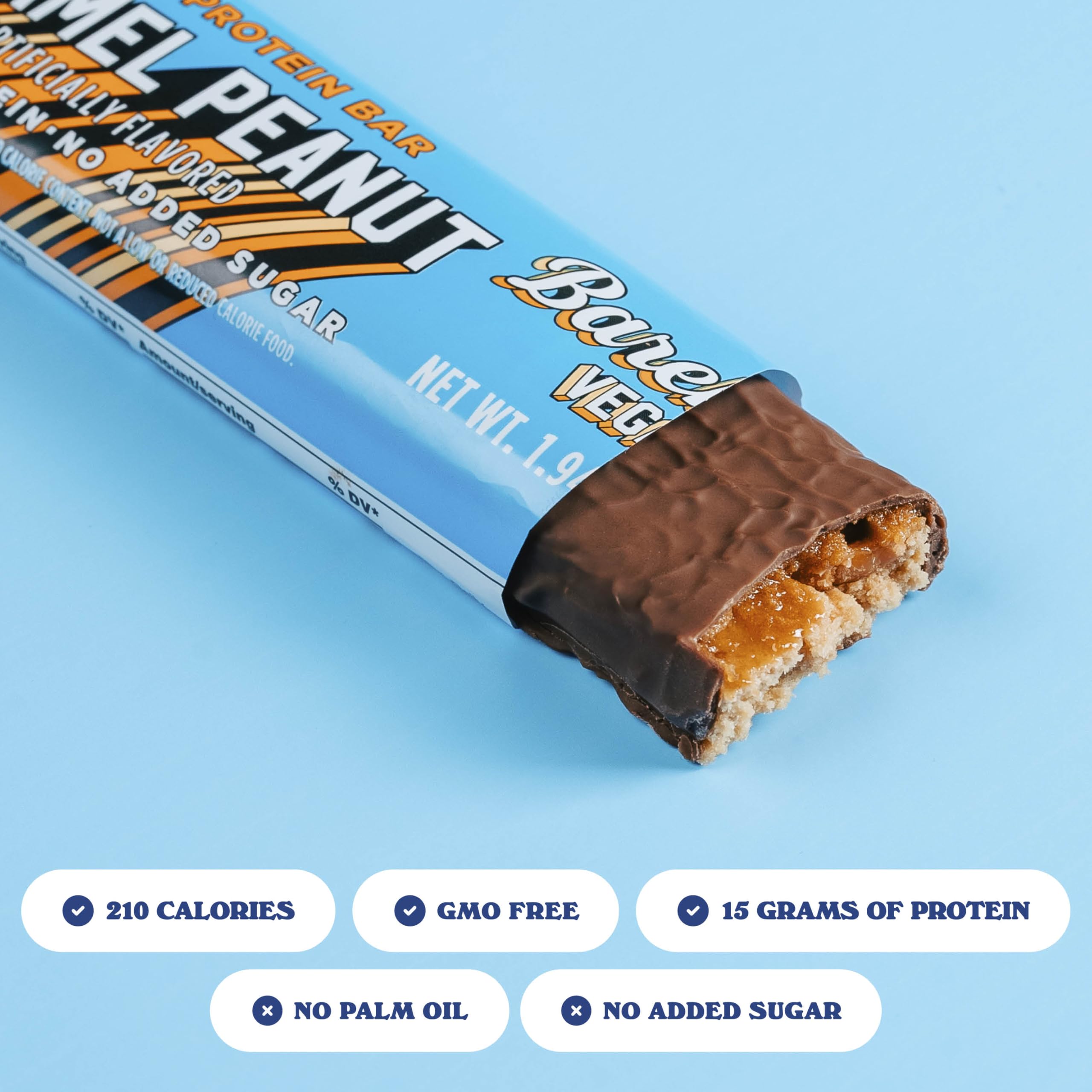 Barebells vegan protein bar peanut caramel break-open reveals filling and bite.