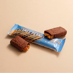 Barebells vegan protein bar peanut caramel nutty crunch texture.