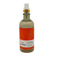 Two bottles included in a holiday gift set with red bow.