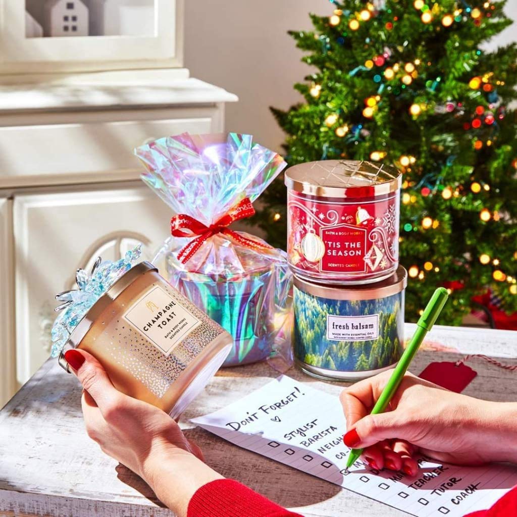 Bath & Body Works Aromatherapy Stress Relief Eucalyptus Tea 3-wick candle evokes room-filling fragrance.
