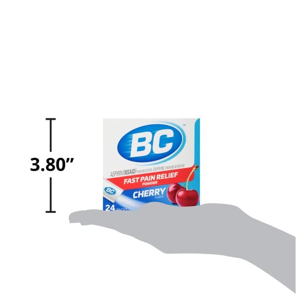Close-up of a BC Powder stick pack being opened for use