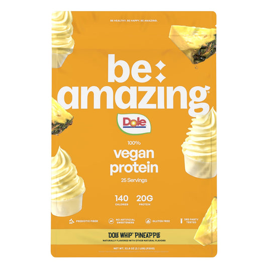 BE AMAZING vegan protein powder Dole Whip Pineapple bottle pour highlights creamy texture and pouring action