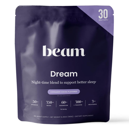 Beam Dream Sleep Powder Cinnamon Cocoa being poured into a mug for a calming night routine