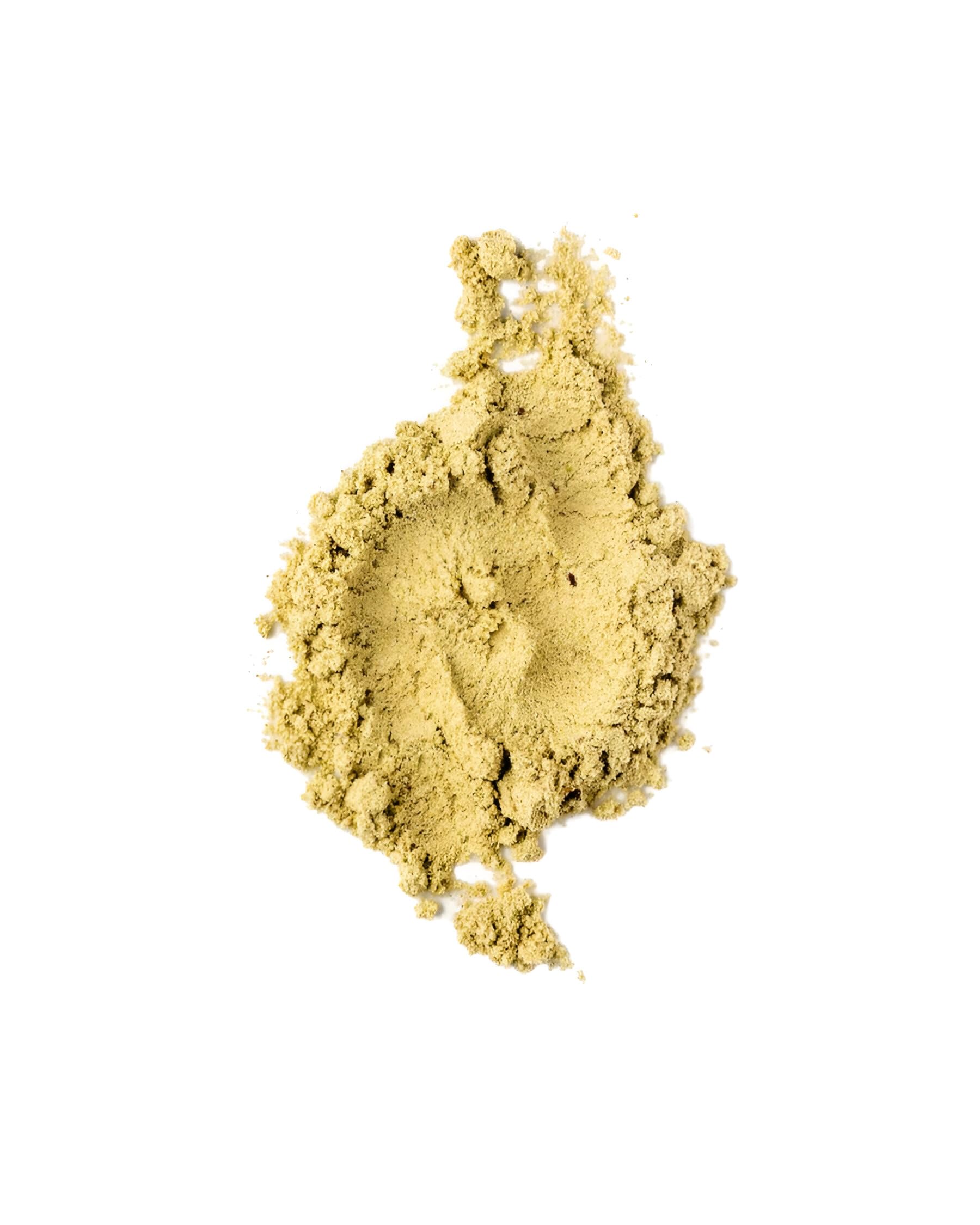 Jar of Bella All Natural Extreme Detox Powder on a kitchen table.