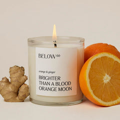 Below 60 blood orange ginger candle closeup for vibrant mood boost