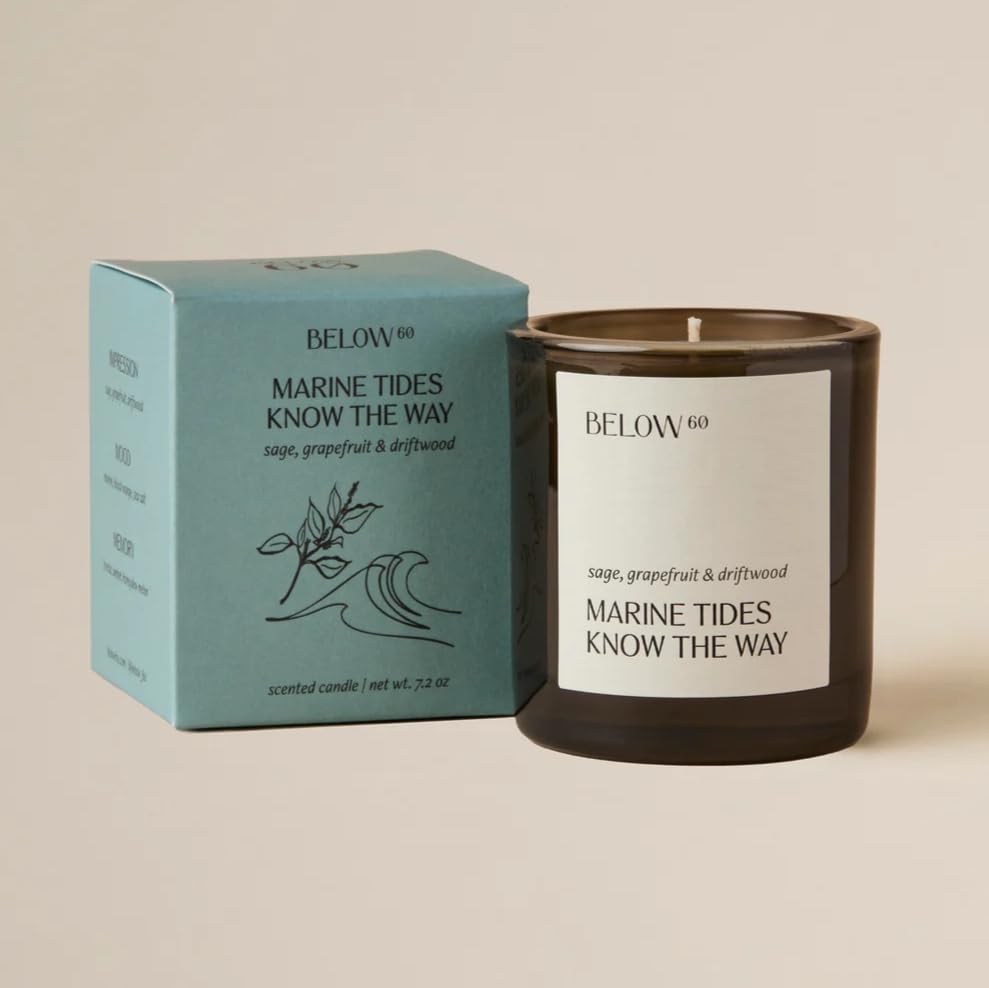 Below 60 Marine Tides driftwood ambience candle showcases warm, relaxing evenings.