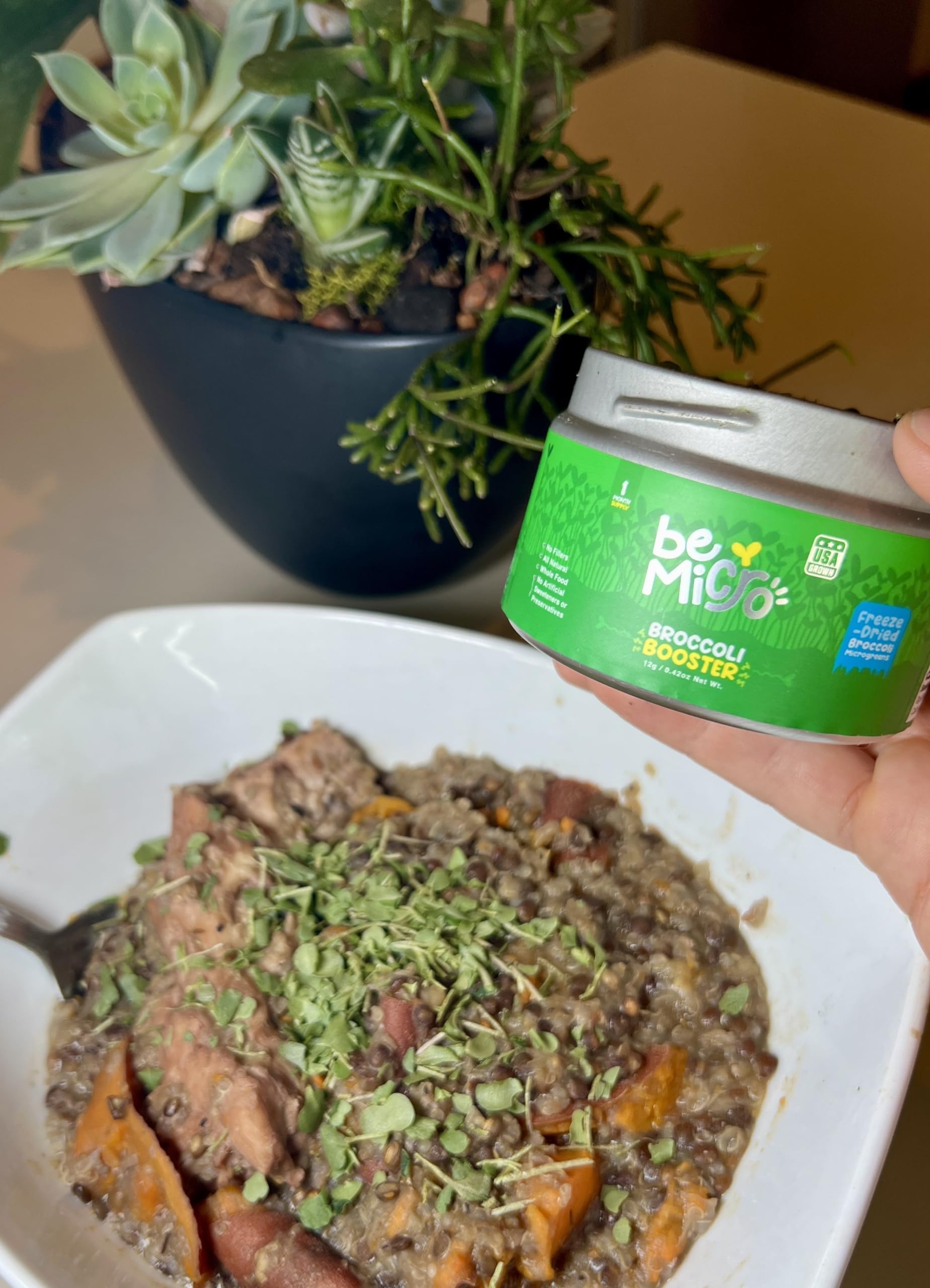 BeMicro tin and spoon, depicting convenient, ready-to-use nutrition.