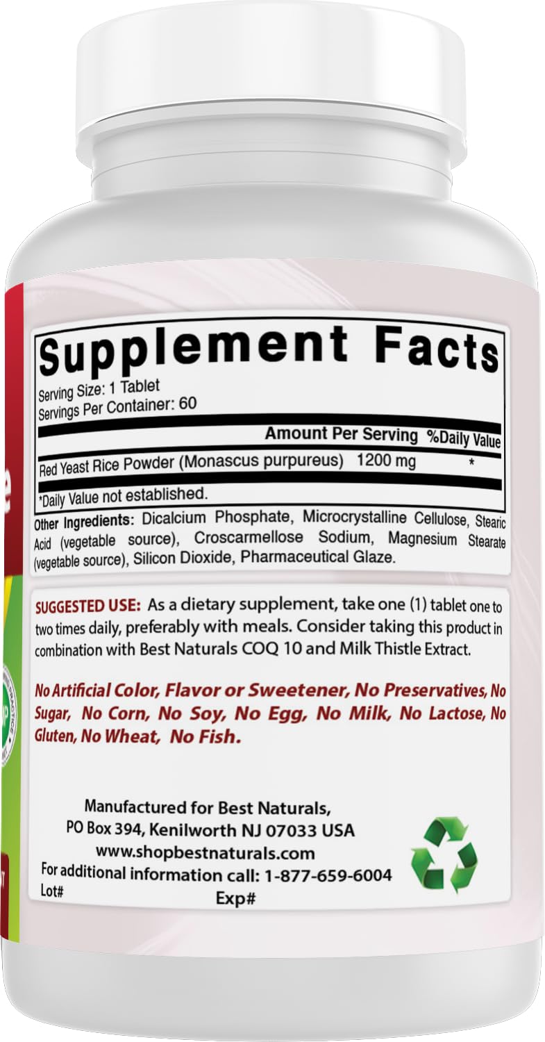 Hand holding Best Naturals Red Yeast Rice tablet shows size.