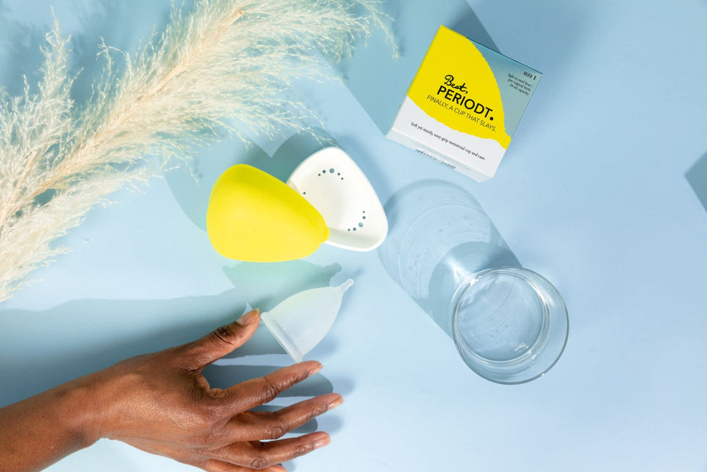 Yellow BEST Periodt case with cup for hygiene and portability.