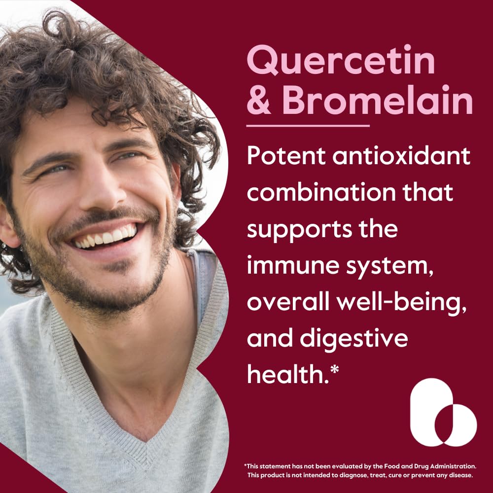 Close-up of quercetin-bromelain capsules poured for digestion support