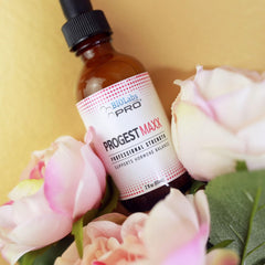 Night-use image of Progest MAXX oil beside the bed.