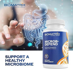 Lifestyle shot of taking Microb-Defend with a meal for balance.