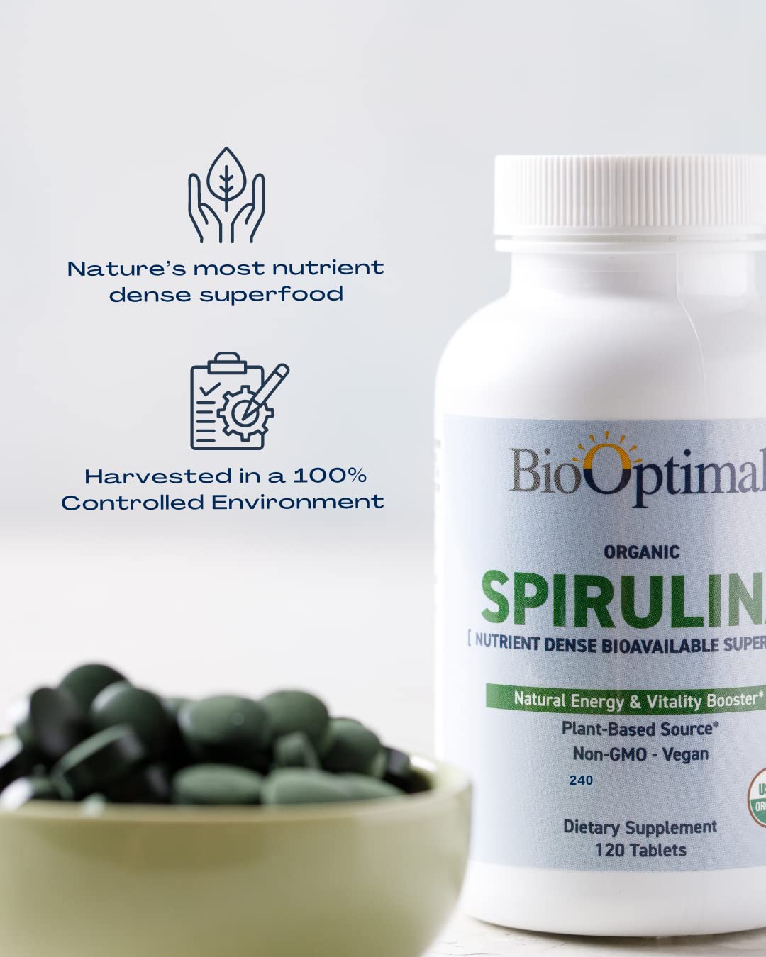 Pouring BioOptimal spirulina tablets illustrates convenient daily intake for busy routines.