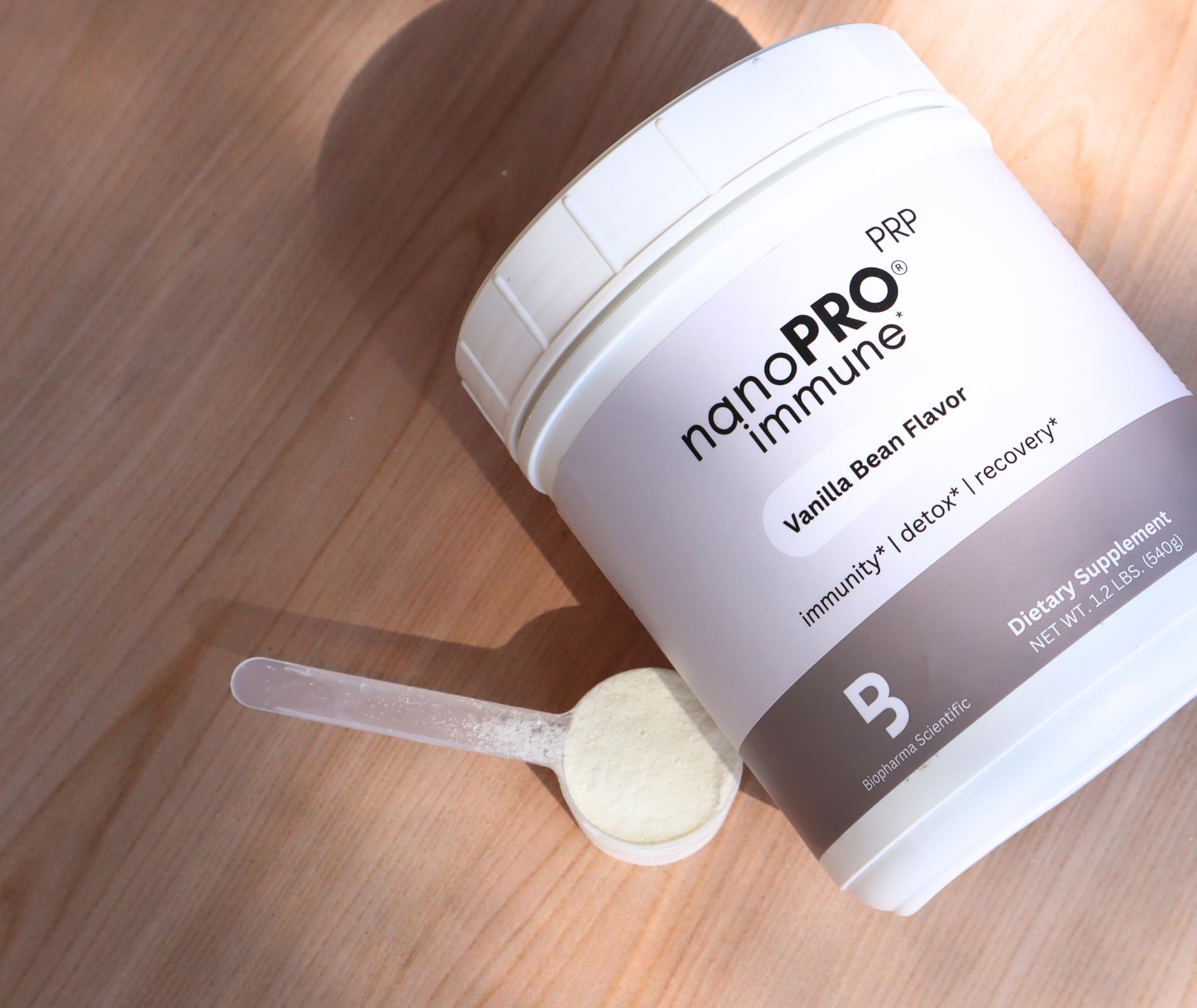 Glass with Nanopro Immune shake ready to hydrate after training.