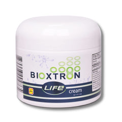 Bioxtron Life capsules being poured signaling daily dosing for energy and vitality.