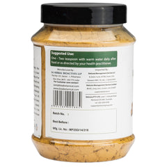 Bixa Botanical Calamus powder prepared with warm water for easy consumption