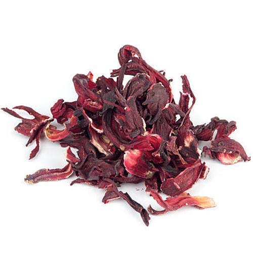 Paste made from Bixa Botanical Hibiscus Powder for scalp care with coconut milk.