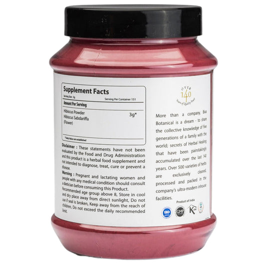 Close-up of Bixa Botanical Hibiscus Powder texture showing a fine, antioxidant-rich formula.