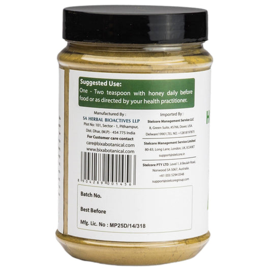 bixa botanical tulsi leaves powder tea premix closeup shows vibrant green leaves