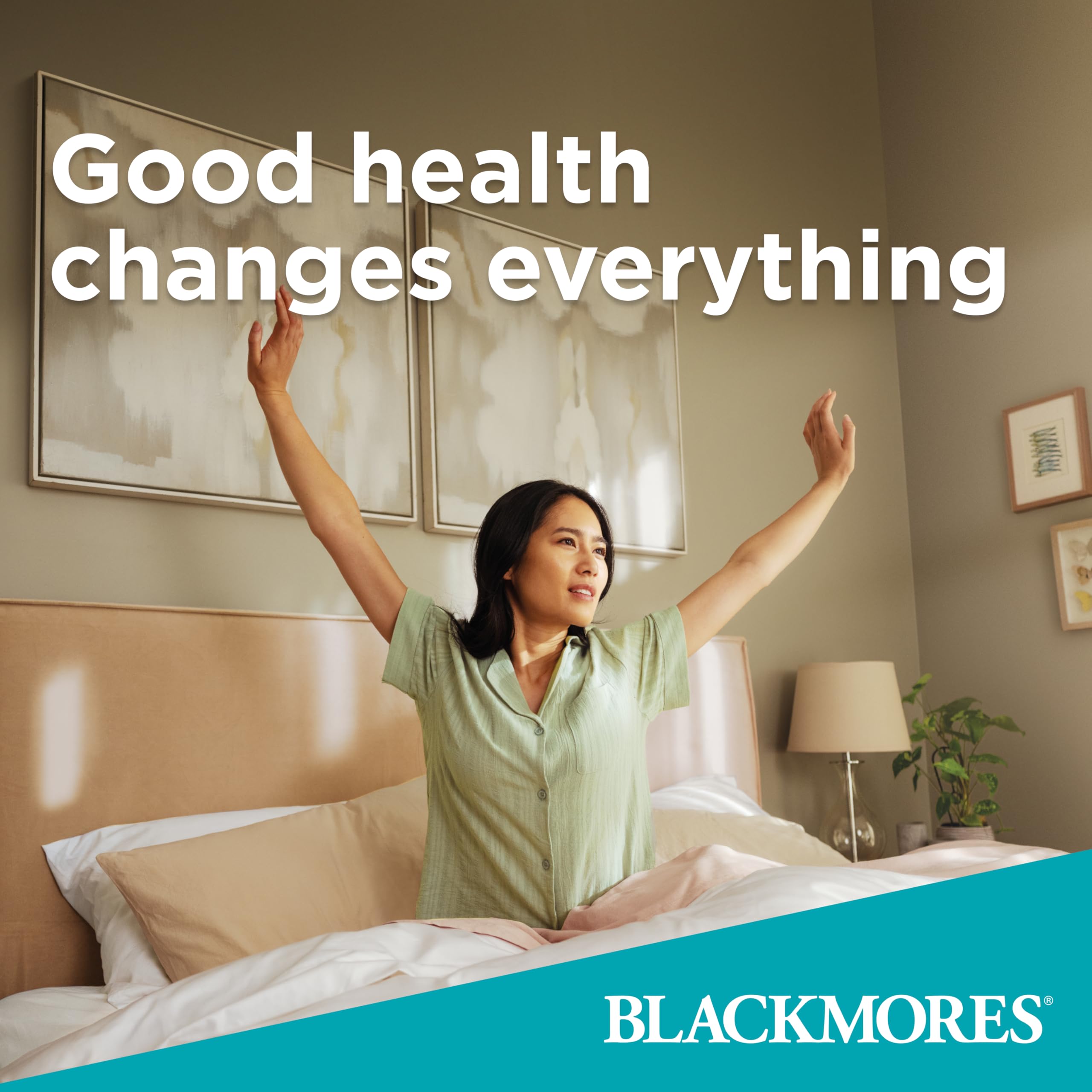 Blackmores Executive B bottle beside planner suggests support for productive days.